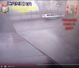 Analysis of collapse dynamics: The Mirror Cinema : 13a A horizontal crack appears in the lower base of the visible pylon leg. It will slightly tilt towards north. More debris falls on the left