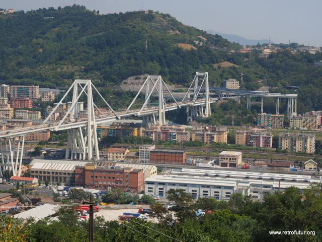 Overview: The Bridge spans over a highly urbanized suburb of Genova at a height of 45m. The leftmost of the three 90m high pylons (numbered 9, 10 and 11) collapsed on August 14, 2018. (68.76 KByte) Foto Documentation August 2015 : Overview: The Bridge spans over a highly urbanized suburb of Genova at a height of 45m. The leftmost of the three 90m high pylons (numbered 9, 10 and 11) collapsed on August 14, 2018.