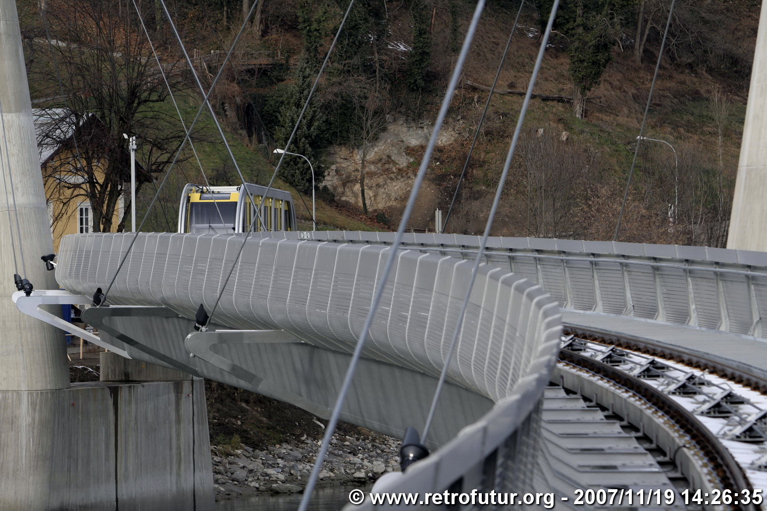 The cable stay bridge over the river Inn : As one can notice, the bridge follows an 