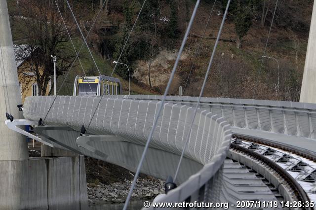 The cable stay bridge over the river Inn : As one can notice, the bridge follows an 